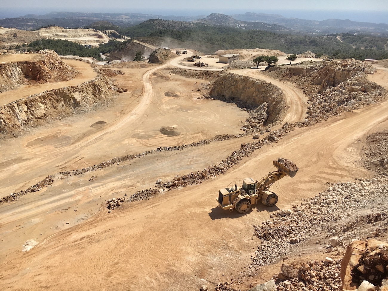 panoramic-quarry-with-a-buldozer